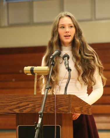 Hannah Cunningham speaking at Poetry Out Loud. (Photo/Steffen Parker)