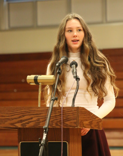 Hannah Cunningham speaking at Poetry Out Loud. (Photo/Steffen Parker)