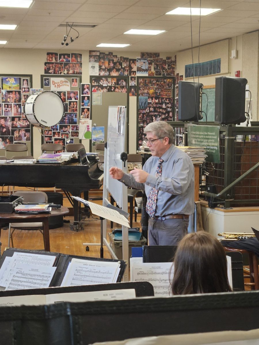 Band teacher John Luce conducting in the band room at Rice. (Photo/Skyler Nichols)