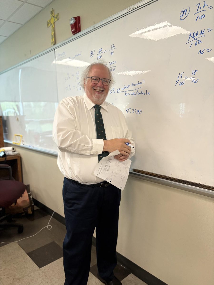 Math teacher Paul DiFalco pausing his teaching for a photo. (Photo/Ella Wright)