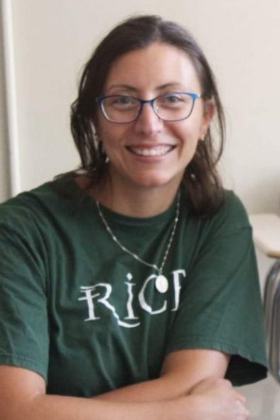 Religion teacher Maureen Bauchan sitting in her classroom. (Photo/Sarah Platzer)