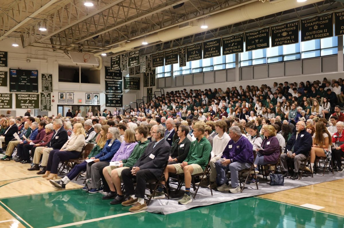 Students and their families fill the Rice gym for the celebration of grandparents' Mass. (Photo/Megan Shrestha)