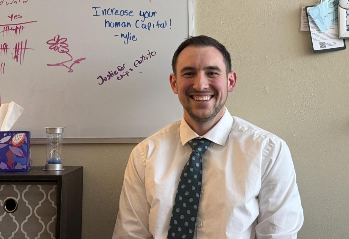 Tyler Barron in his office. (Photo/Logan Forcier)