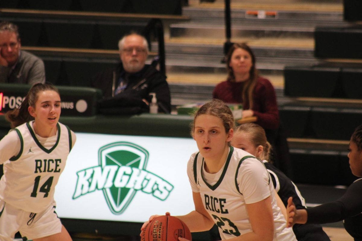 Senior Mary Biggins dribbles the ball in the first quarter of her Senior Game against St. Johnsbury Academy.