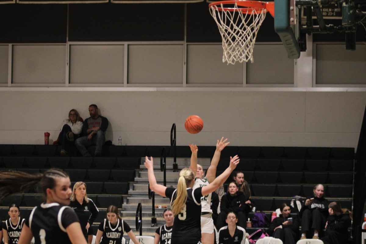 Senior Bella Messineo shoots a three from the corner on her Senior Night, February 17, 2026.