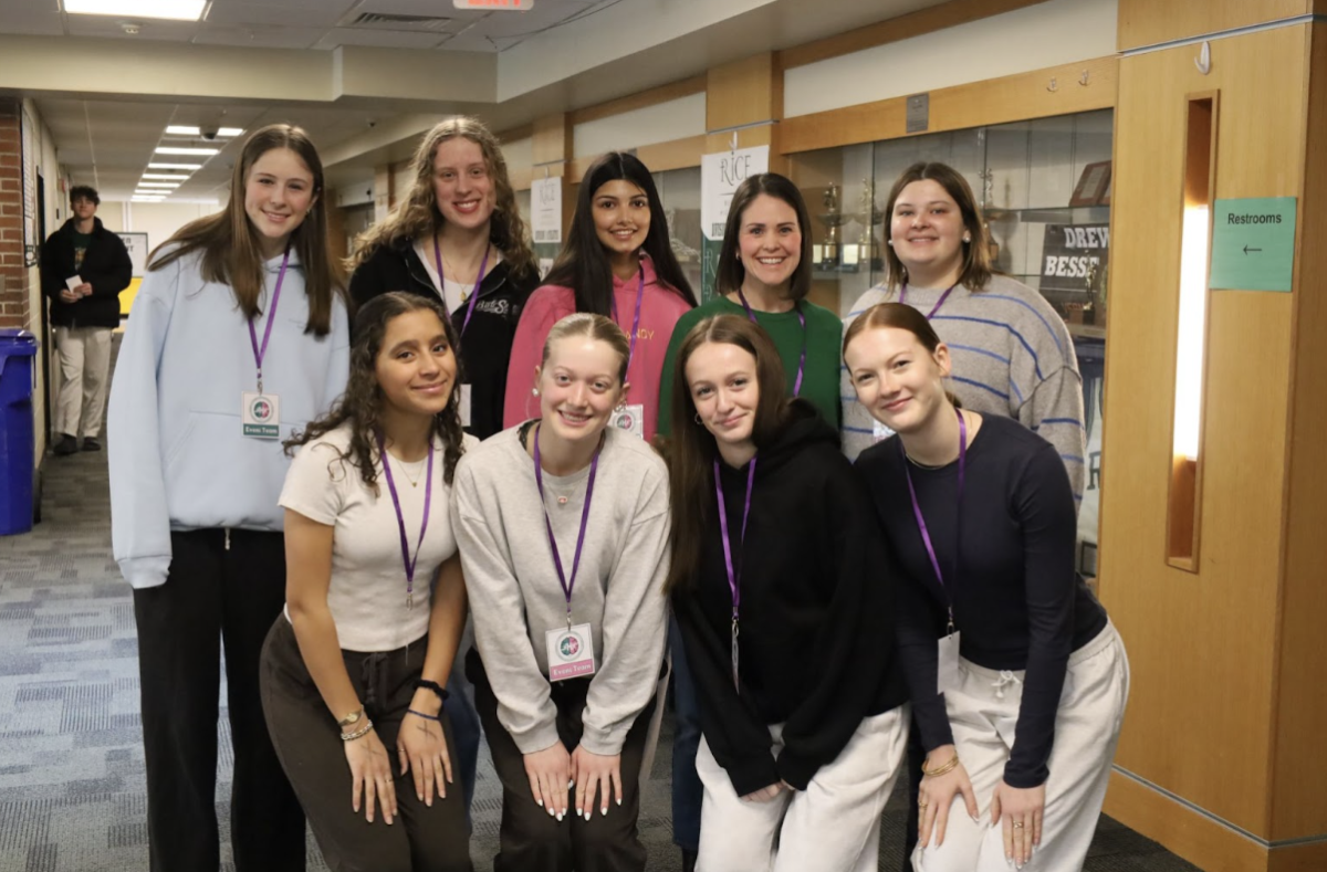 Student leaders with librarian and Mental Health Awareness Day co-organizer Genevieve Trono ready for the students to arrive before the speaker. (Photo/Megan Strestha) 